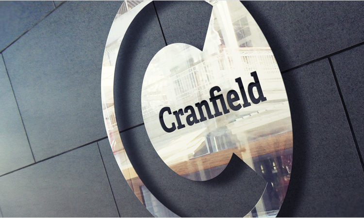 Cranfield University logo shown as chrome building signage