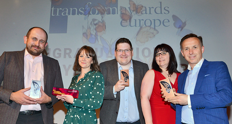 Nick Gazard from Clergy Support Trust with Josie Evans, David Crichton, Denise Atkins and Ollie Leggett from IE Brand. Showing their Transform Awards trophies. 