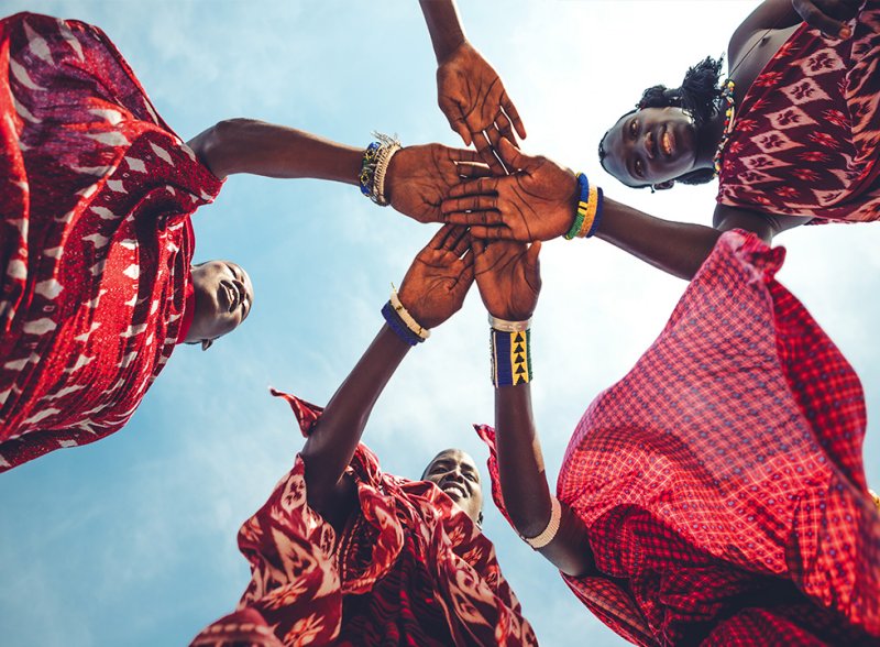 CHIPS charity brand image of 5 colourfully dressed African people 